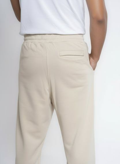 Front-Pleated Straight-Leg Cotton Sweatpants - Beige